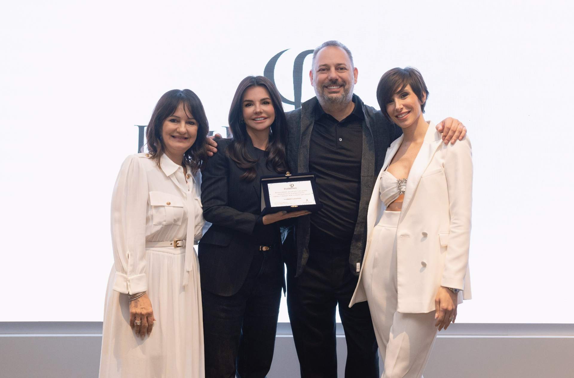 Sabrina Zanin receiving her PhiAward from Branko Babić, founder of Phi Academy